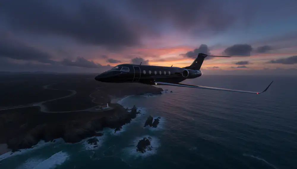 Private jet flying over a scenic coastline
